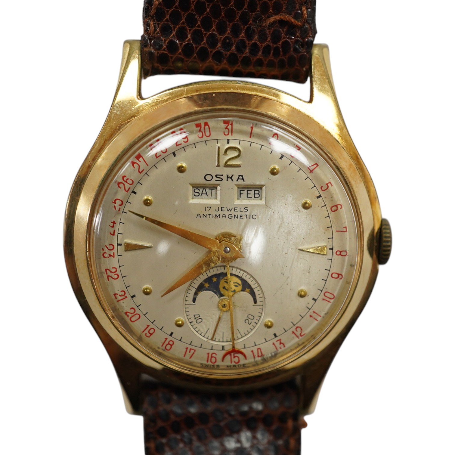 A gentleman's 1950's? steel and gold plated Oska Calendar Moonphase manual wind wrist watch, case diameter 32mm, on a later associated strap. Condition - poor to fair